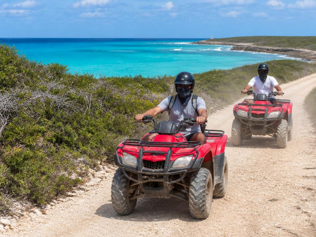 ATV tour on a coastal trail with turquoise water in Grand Turk